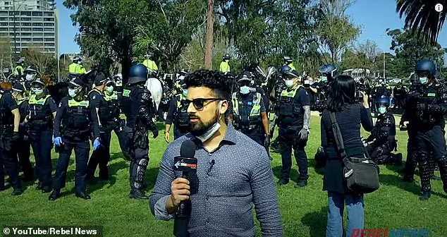 Avi Yemini reporting for Rebel News from a lockdown protest in Melbourne, Australia. (Rebel News)