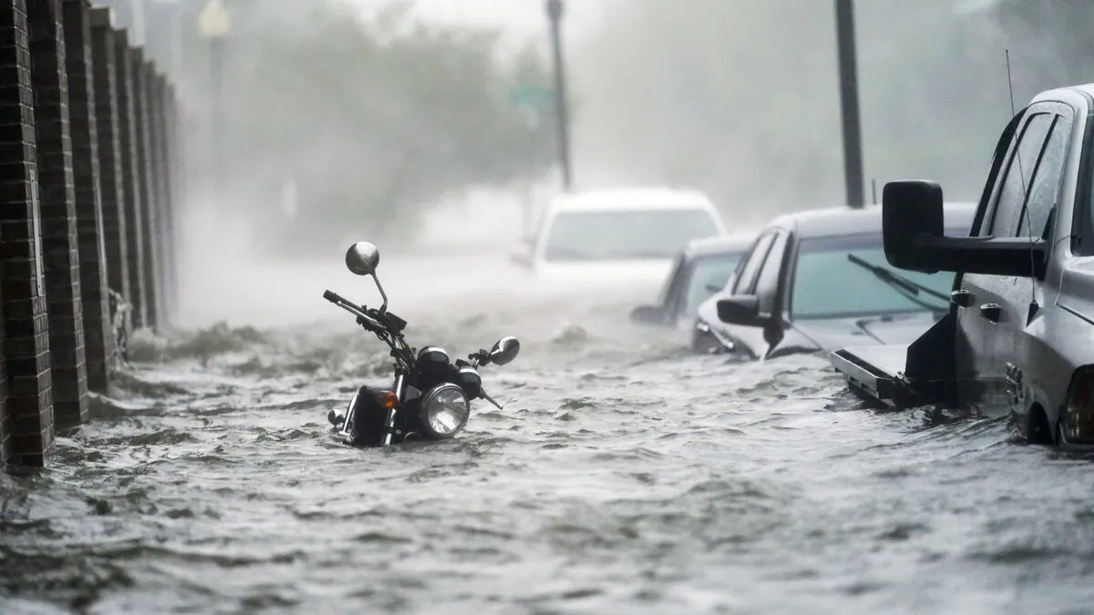 Floodwaters move on the street in Pensacola, Fla.,  on Sept. 16, 2020. (Gerald Herbert/AP)