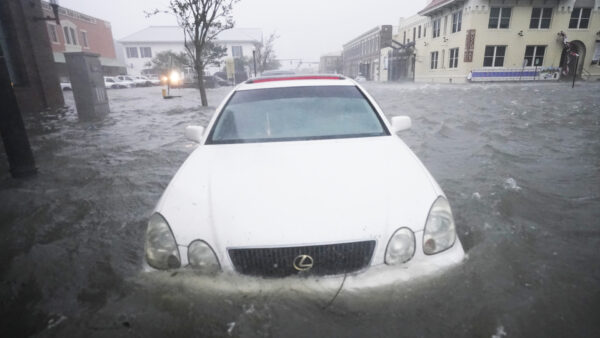 Flood waters move on the street