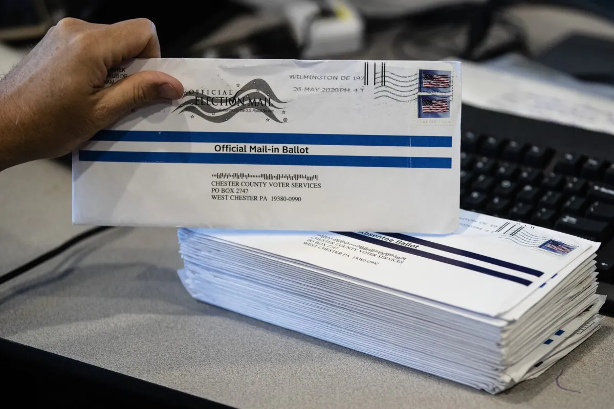 Mail-in primary election ballots are processed at the Chester County Voter Services office in West Chester, Pa., on May 28, 2020. (Matt Rourke/AP Photo)
