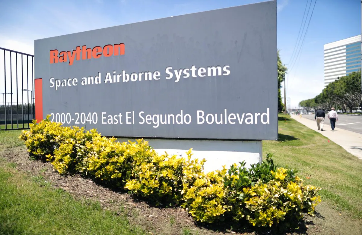 A company sign is posted at a Raytheon Co. campus in El Segundo, Calif., on June 10, 2019. (Mario Tama/Getty Images)