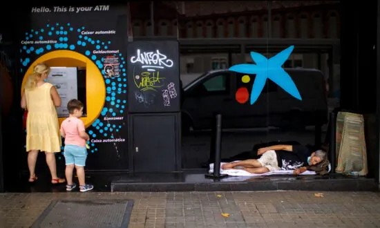 Spanish Banks Merge in Sign of Hard Economic Times Ahead