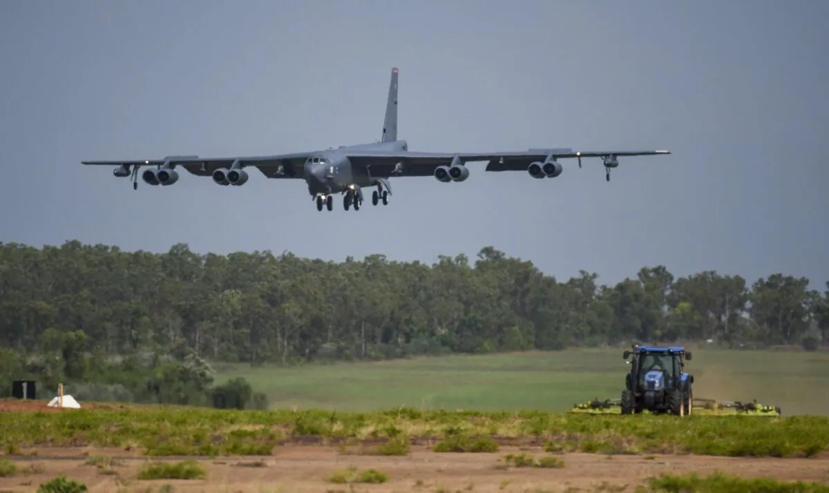 A U.S. Air Force B-52 Stratofortress bomber, assigned to the 96th Expeditionary Bomb Squadron, deployed from Barksdale Air Force Base, La., lands during exercise Lightning Focus at Royal Australian Air Force Base (RAAF) in Darwin, Australia, on Dec. 6, 2018. (U.S. Air Force photo by Senior Airman Christopher Quail via AP)