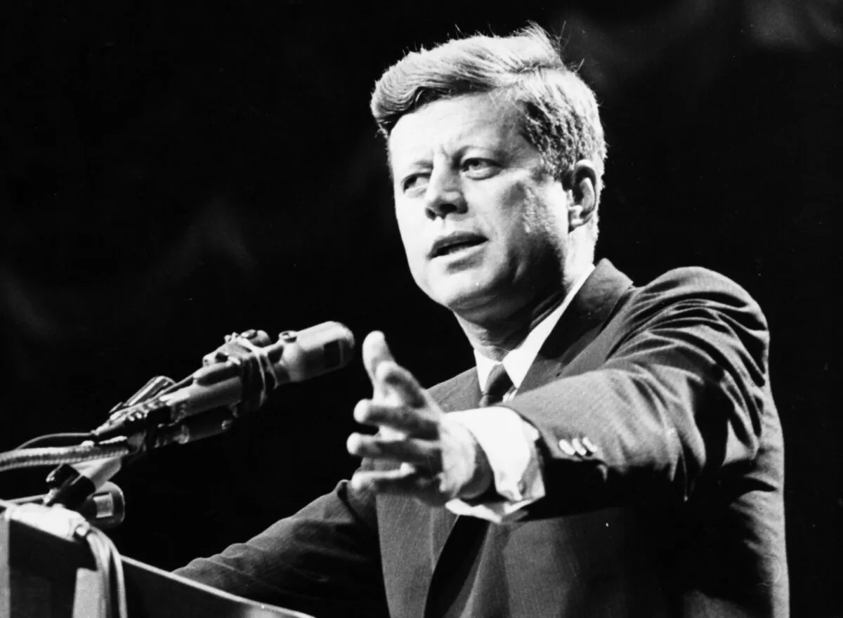 President John F. Kennedy urged citizens to find the right answers,, rather than partisan, to America’s problems. (Central Press/Getty Images)