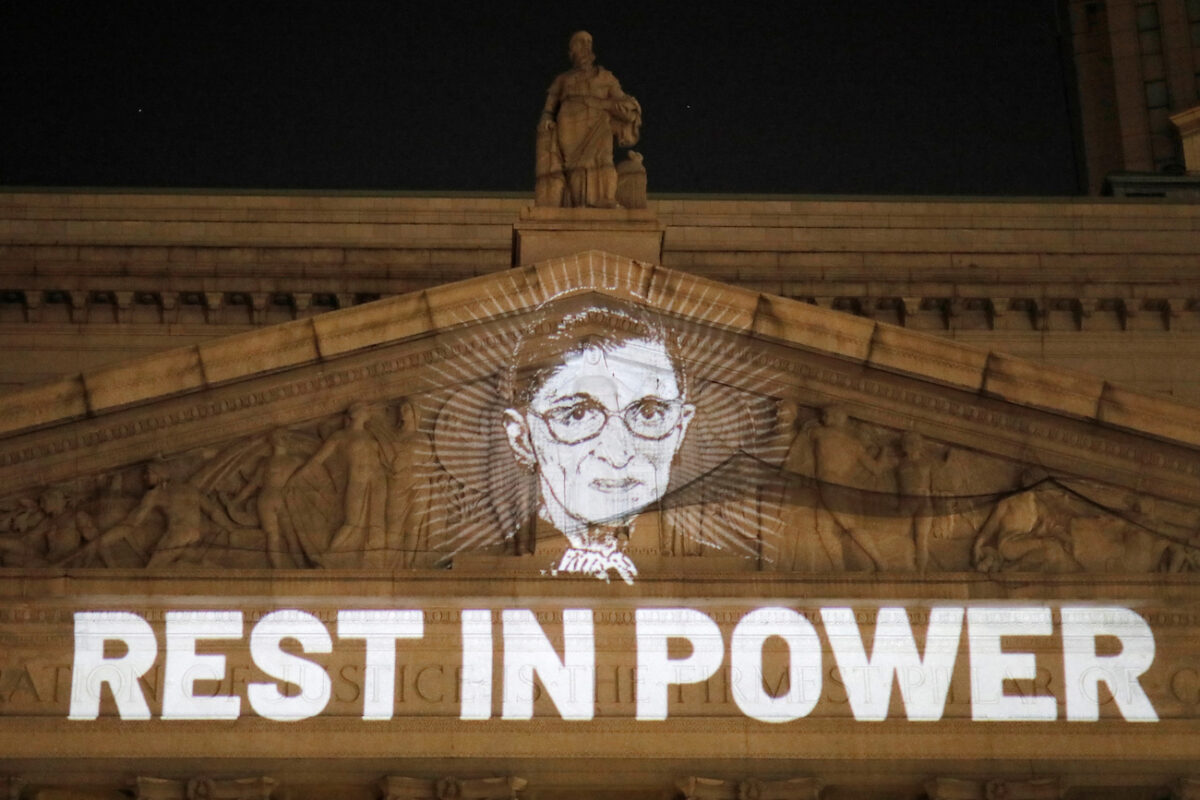 An image of Associate Justice of the Supreme Court of the United States Ruth Bader Ginsburg is projected onto the New York State Civil Supreme Court building in Manhattan, New York City, U.S. after she passed away