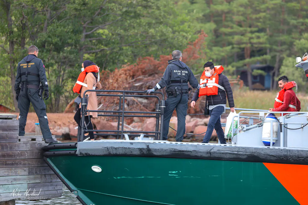 People are evacuated by boat from the Amorella cruise ship near the Aland islands, seen from Finland, on Sept. 20, 2020. (Niclas Norlund/Lehtikuva via AP)