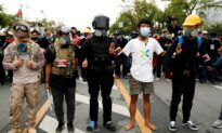 Thai Protesters Challenge Monarchy as Huge Protests Escalate