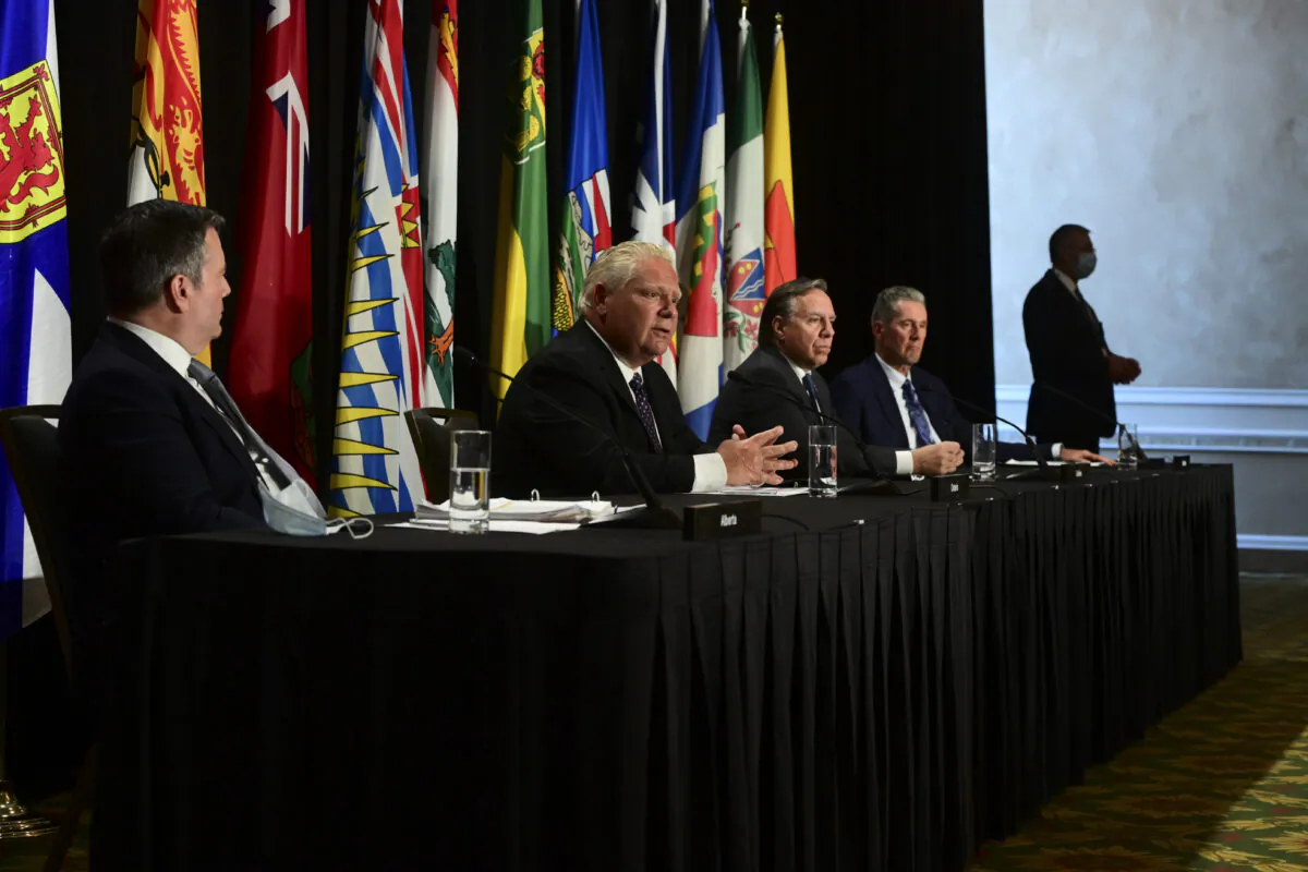 Ontario Premier Doug Ford (2nd L) speaks as Alberta Premier Jason Kenney (L), Quebec Premier Francois Legault (3rd R), and Manitoba Premier Brian Pallister (R) look on during a press conference in Ottawa on Sept. 18, 2020.  (Sean Kilpatrick/The Canadian Press)