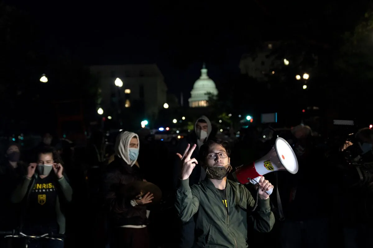 Protesters make noise outside the home of Sen. Lindsey Graham (R-S.C.) in Washington on Sept. 21, 2020. (Alex Edelman/AFP via Getty Images)