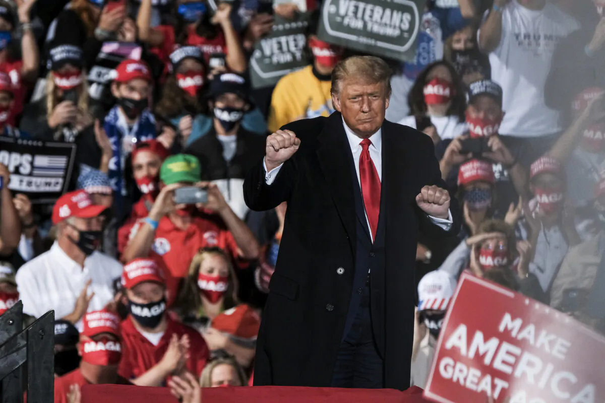 President Donald Trump charges up the crowd while speaking at a campaign rally at the Toledo Express Airport, in Swanton, Ohio, on Sept. 21, 2020. (Matthew Hatcher/Getty Images)