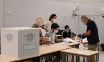 Italians Turn Out to Vote Despite Virus, Back Lawmaker Cuts