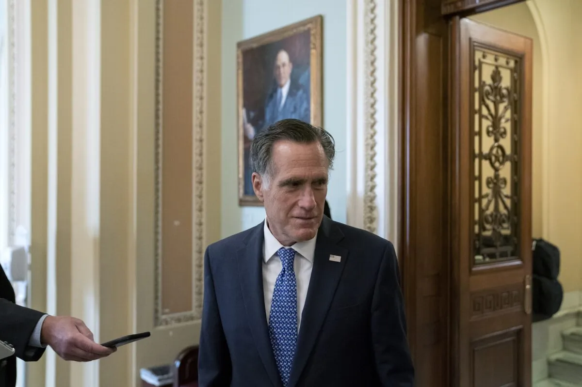 Sen. Mitt Romney (R-Utah) speaks to reporters at the U.S. Capitol in Washington on Sept. 21, 2020. (Stefani Reynolds/Getty Images)