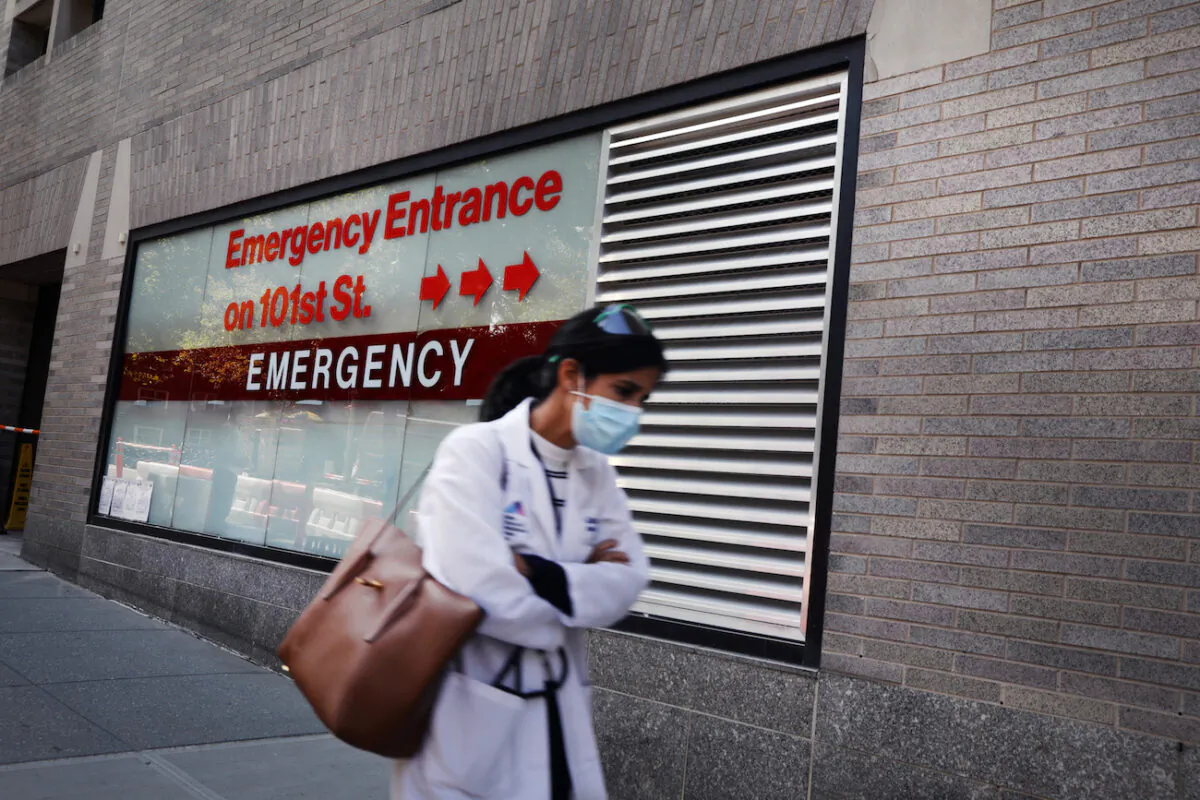 A person walks past an "Emergency Entrance" sign at Mount Sinai Hospital in Manhattan in New York City on Sept. 22, 2020. (Spencer Platt/Getty Images)