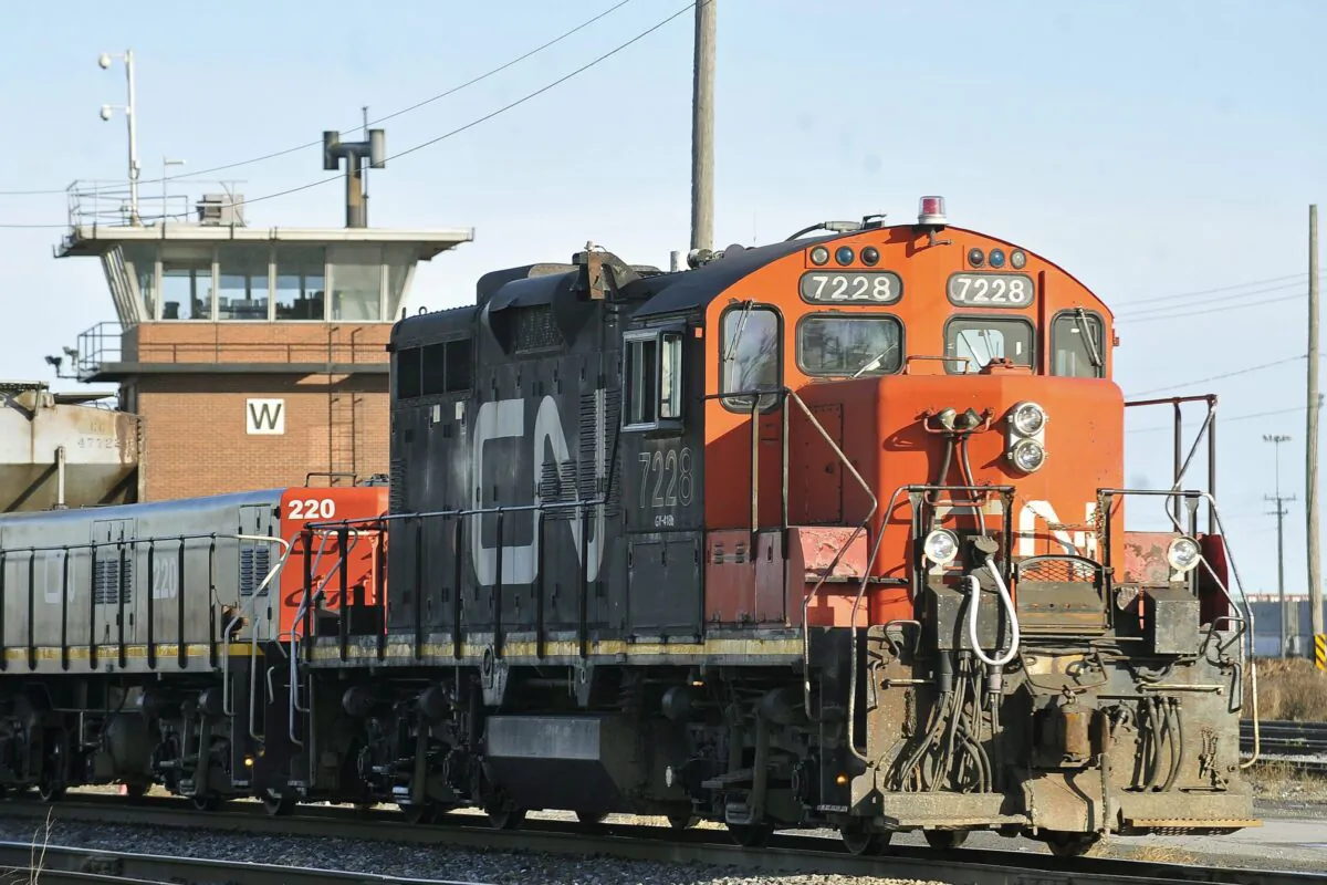 A CN freight train makes its way through the CN Taschereau Yard in Montreal in a file photo. (Graham Hughes/The Canadian Press)