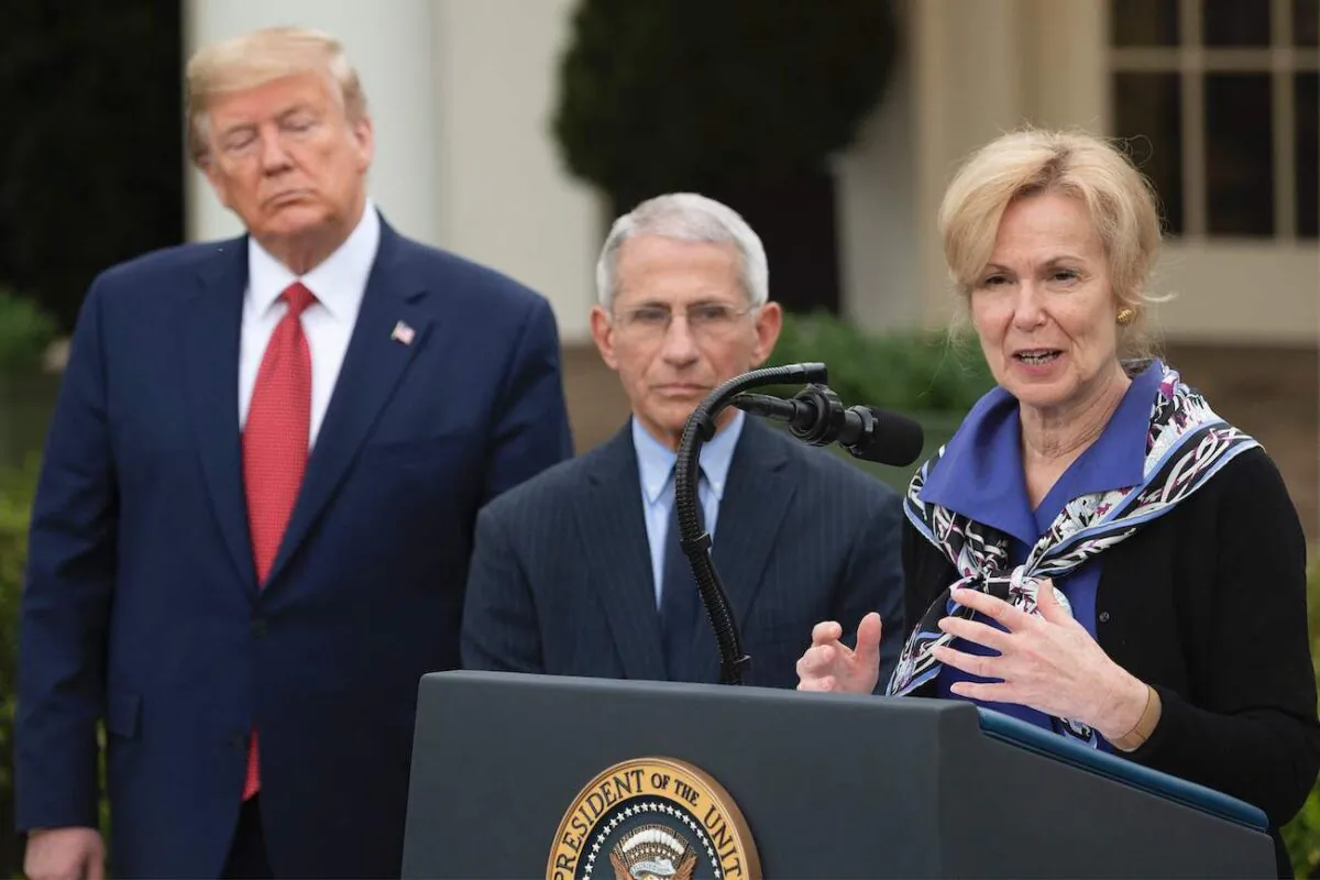 Dr. Deborah Birx (R) speaks alongside former President Donald Trump and NIAID director Dr. Anthony Fauci during a briefing at the White House in Washington, on March 29, 2020. (Jim Watson/AFP via Getty Images)