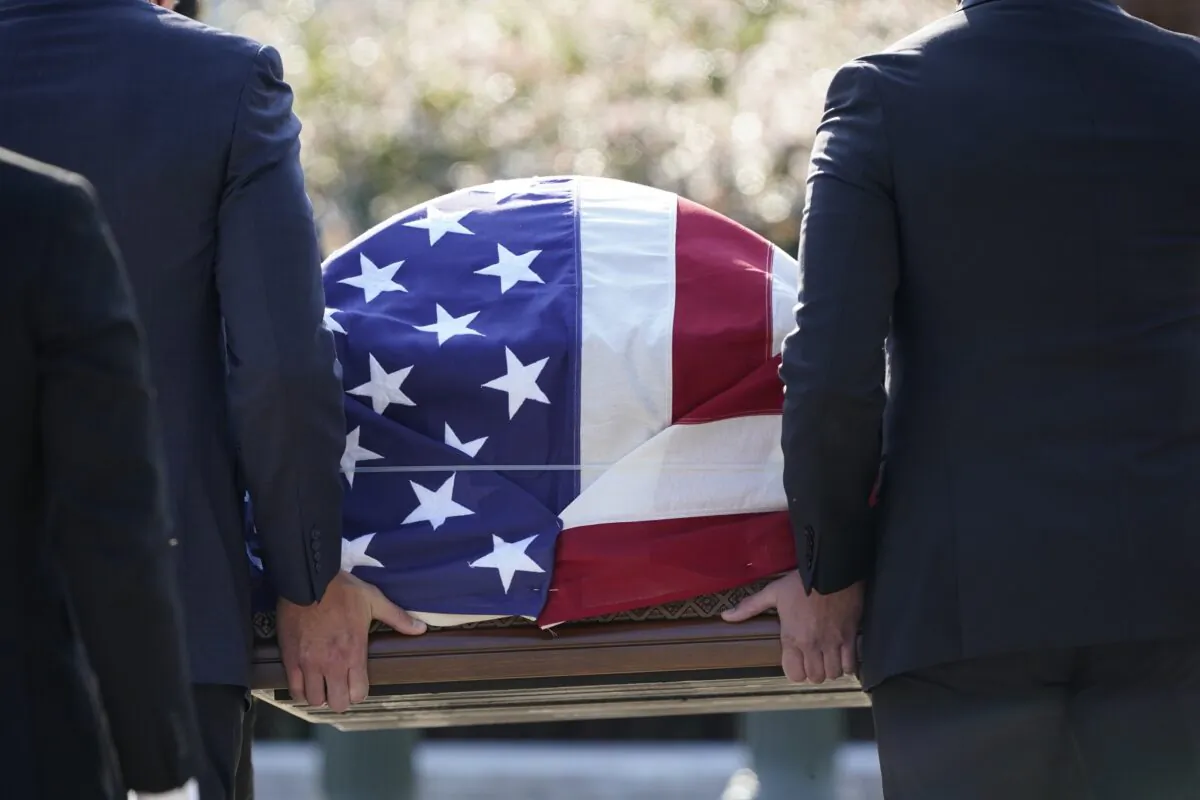 The flag-draped casket of Justice Ruth Bader Ginsburg arrives at the Supreme Court in Washington on Sept. 23, 2020. (J. Scott Applewhite/AP Photo)
