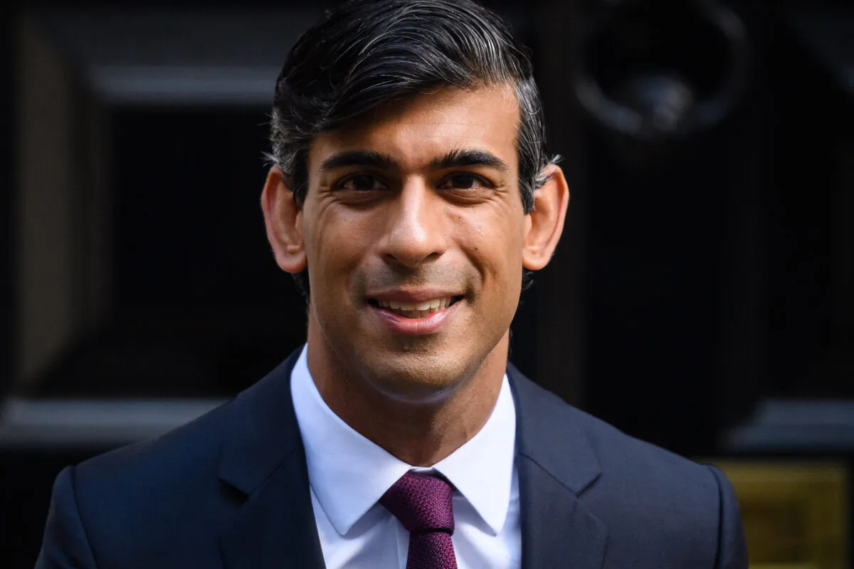 The Chancellor of the Exchequer, Rishi Sunak, who laid out further measures to aid the British economy and workforce as CCP virus cases continue to rise across the UK, poses for photographs outside 11 Downing Street in London on Sept. 24, 2020. (Leon Neal/Getty Images)