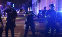 Suspect Identified in Shooting of 2 Louisville Officers Amid Unrest