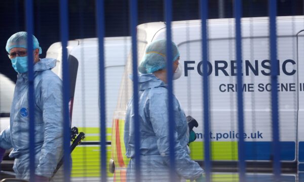 Forensic specialists are seen at the custody centre