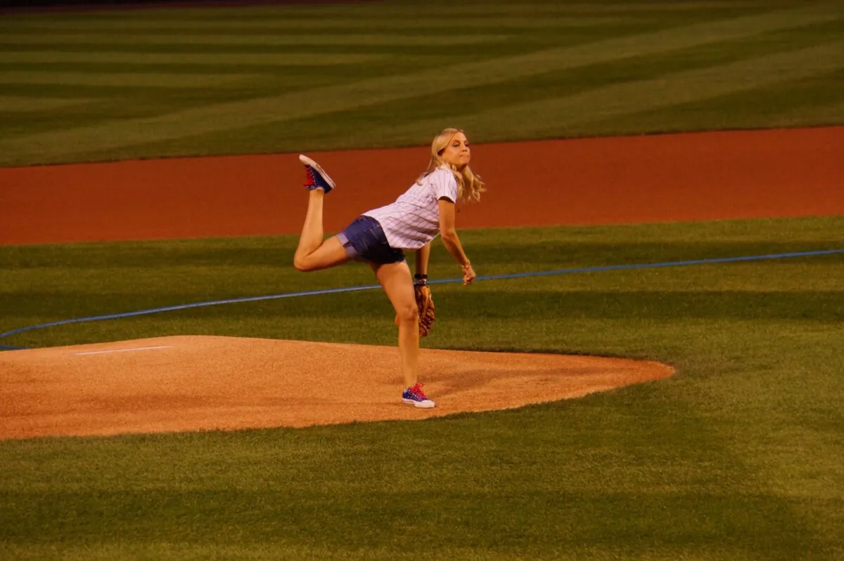 Katie Russell Newland throws the first pitch at Wrigley Field in Chicago. (Courtesy of Katie Russell Newland)