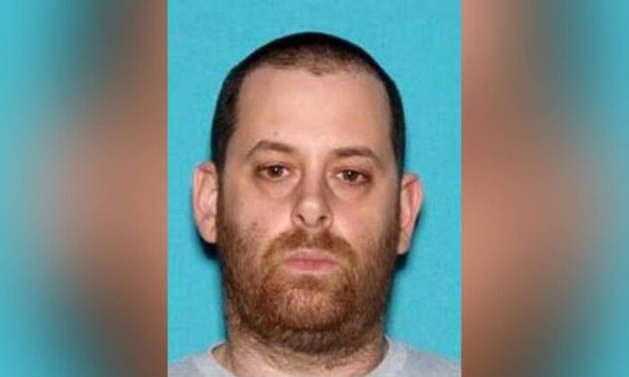 Undated photo of  Michael James Pratt, a New Zealander, who is wanted for sex trafficking and child porn charges. (via FBI)