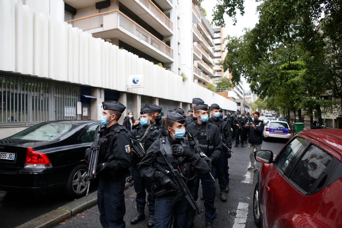 French police officers patrol the area after a knife attack near the former offices of satirical newspaper Charlie Hebdo, in Paris, on Sept. 25, 2020. (Thibault Camus/AP Photo)