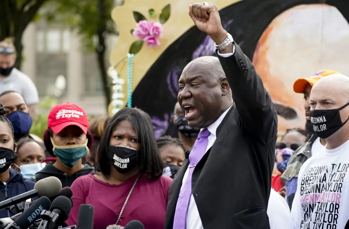 Breonna Taylor family attorney Ben Crump, center speaks during a news conference in Louisville, Ky., on Sept. 25, 2020. (Darron Cummings/AP Photo)
