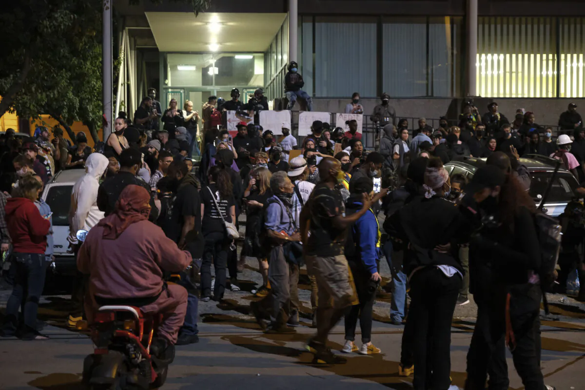 Protestors take refuge at First Unitarian Church of Louisville in Louisville, Ky., Sept. 24, 2020. (Jeff Dean/AFP via Getty Images)