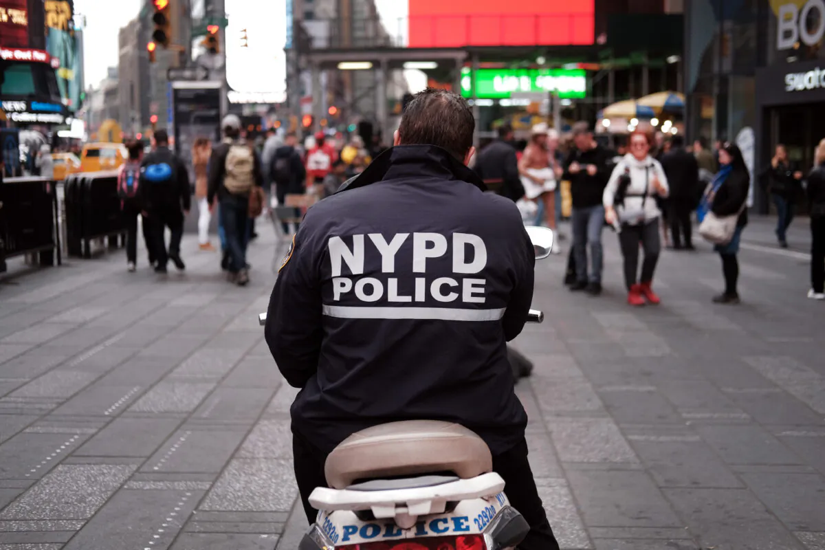 A police officer sits on a scooter in Times Square in New York City, on Nov. 5, 2019. (Spencer Platt/Getty Images)