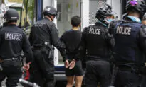 Seattle Police Officer Placed On Administrative Leave After Video Shows Protester Run Over With Bike