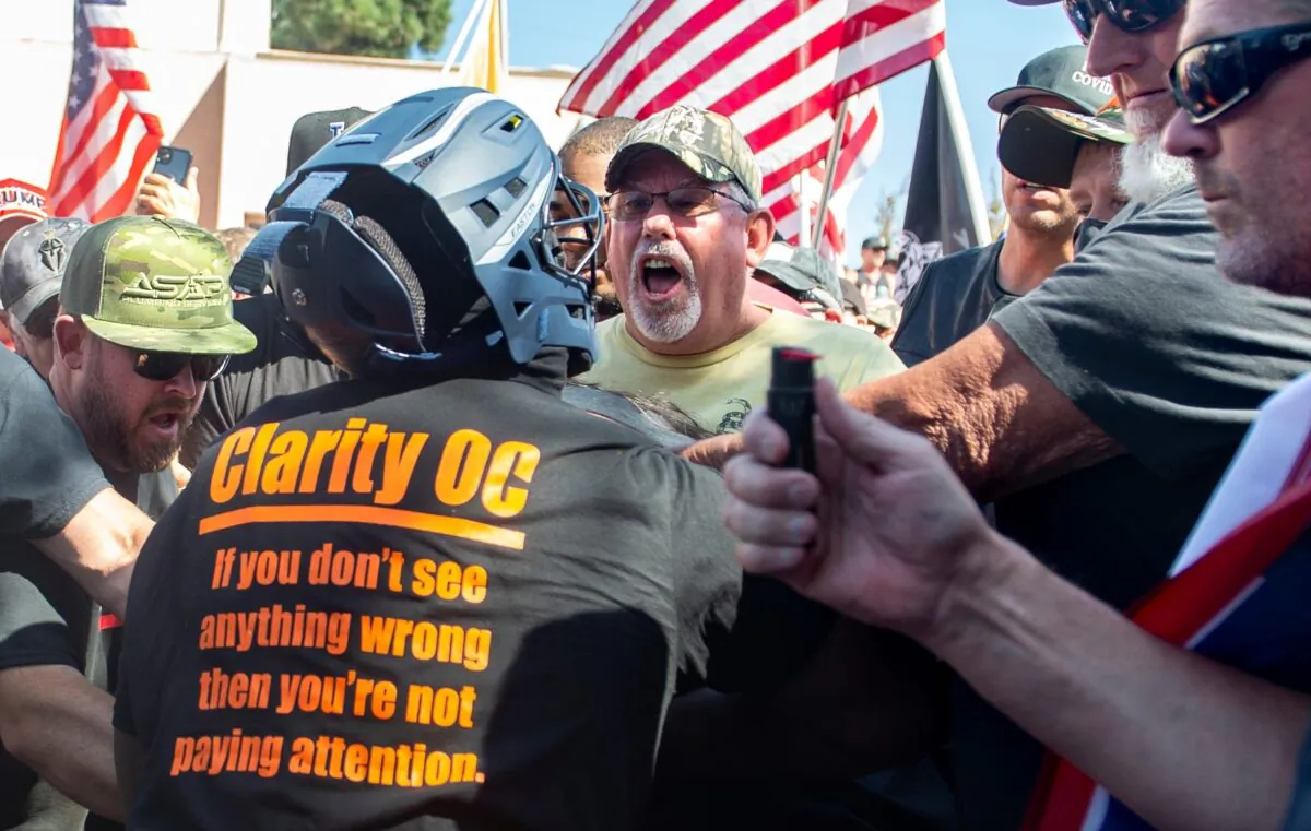 Black Lives Matter protesters and counter protesters clash in Yorba Linda, Calif., Sept. 26, 2020. (Mindy Schauer/The Orange County Register via AP)