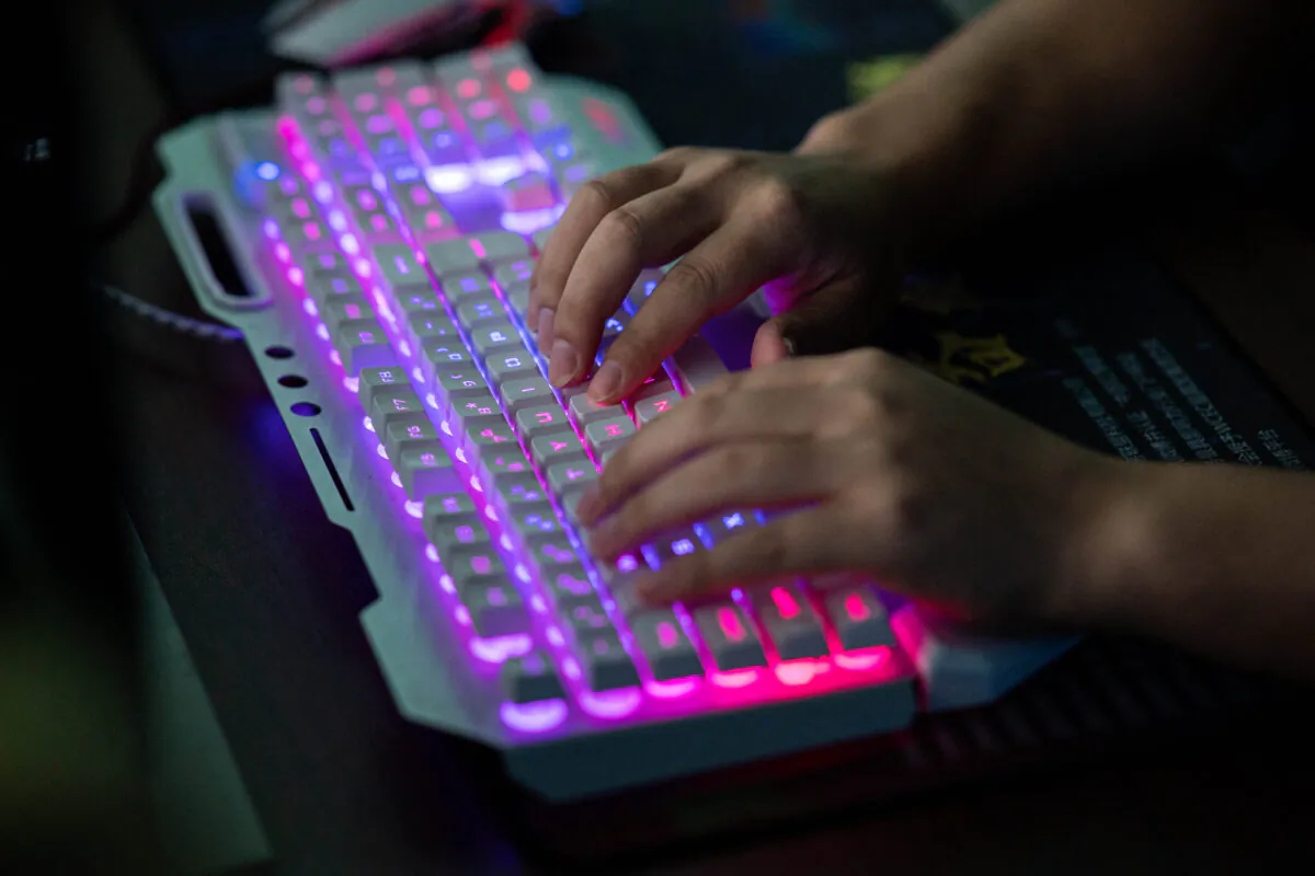 A member of a hacking group uses his computer at their office in Dongguan, Guangdong province, China, on Aug. 4, 2020. (Nicolas Asfouri/AFP via Getty Images)