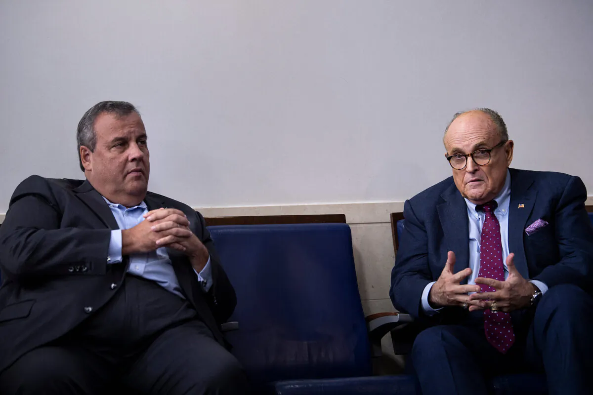 Former New Jersey Gov. Chris Christie (L) listens while former New York City Mayor Rudy Giuliani speaks during a briefing at the White House in Washington on Sept. 27, 2020. (Brendan Smialowski/AFP via Getty Images)