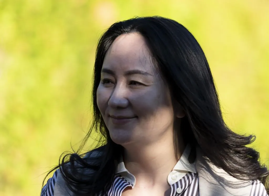 Meng Wanzhou leaves her home to head to Supreme Court in Vancouver on Sept. 28, 2020.  (Jonathan Hayward/The Canadian Press)