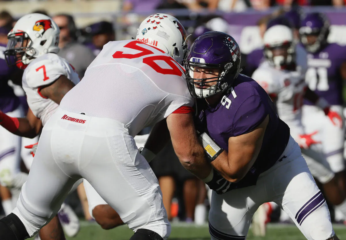 An Illinois State Redbirds football player squares off against a member of the Northwestern Wildcats team in Evanston, Ill., on Sept. 10, 2016. (Jonathan Daniel/Getty Images)