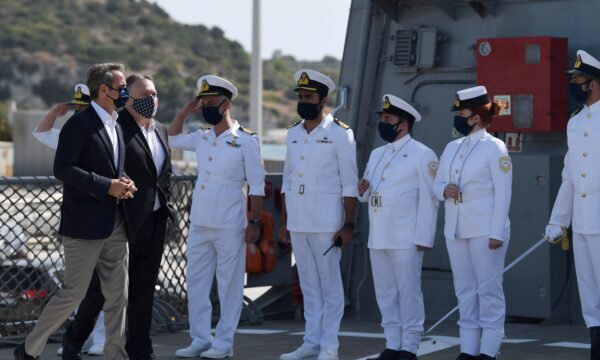 Mike Pompeo and Greek Prime Minister Kyriakos Mitsotakis are saluted
