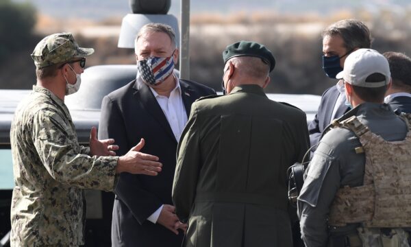 Mike Pompeo speaks to officers during his visit