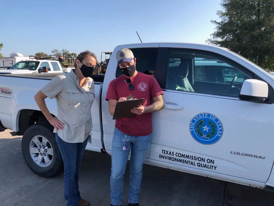 Investigators from the Texas Commission on Environmental Quality are present on a scene in Lake Jackson to conduct water sampling after a brain-eating amoeba was detected in the water supply in Lake Jackson, Texas, on Sept. 26, 2020. (Texas Commission on Environmental Quality/Handout via Reuters)