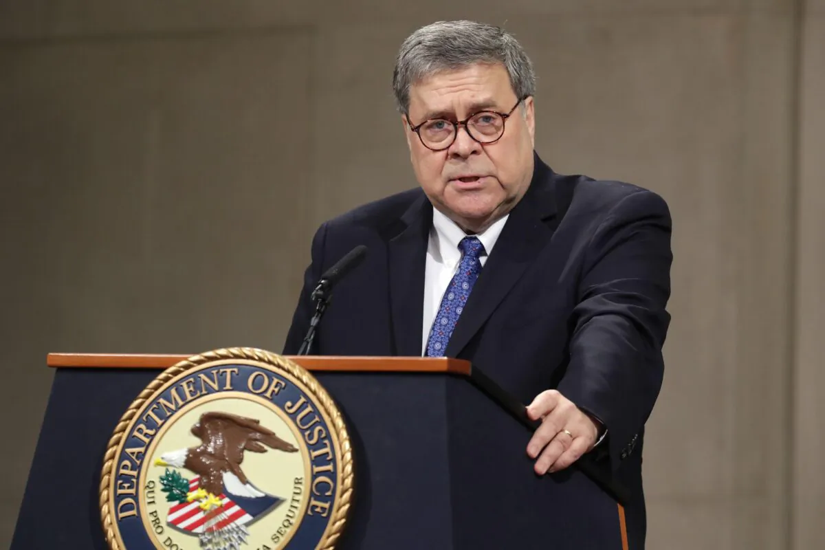 U.S. Attorney General William Barr delivers remarks during a farewell ceremony for Deputy Attorney General Rod Rosenstein at the Robert F. Kennedy Main Justice Building in Washington on May 9, 2019. (Chip Somodevilla/Getty Images)