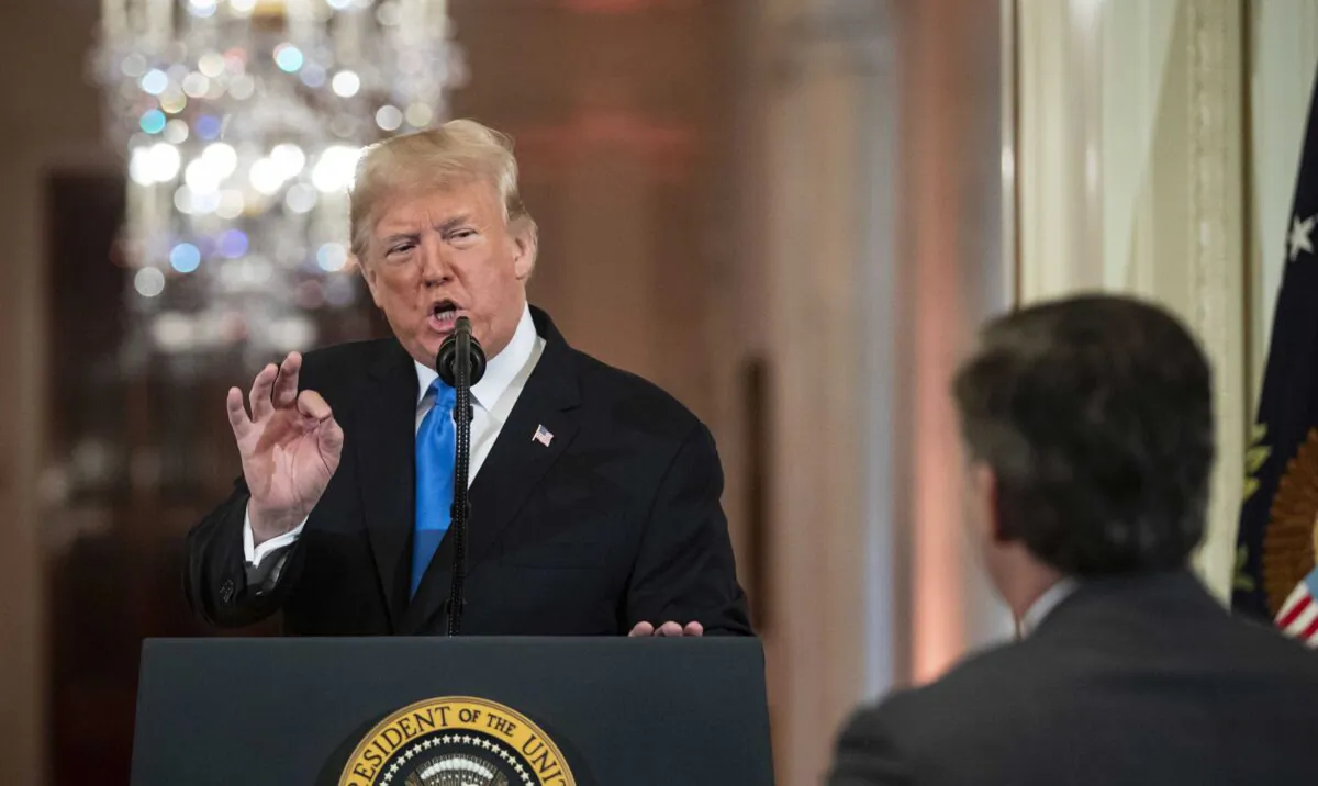 President Donald Trump gets into an exchange with CNN reporter Jim Acosta during a news conference in the East Room of the White House in Washington on Nov. 7, 2018. (Al Drago/Pool/Getty Images)