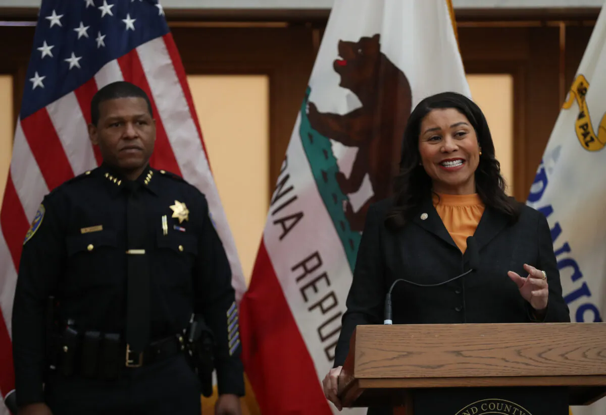 San Francisco Mayor London Breed (R) speaks during a press conference at San Francisco City Hall on March 16, 2020. (Justin Sullivan/Getty Images)