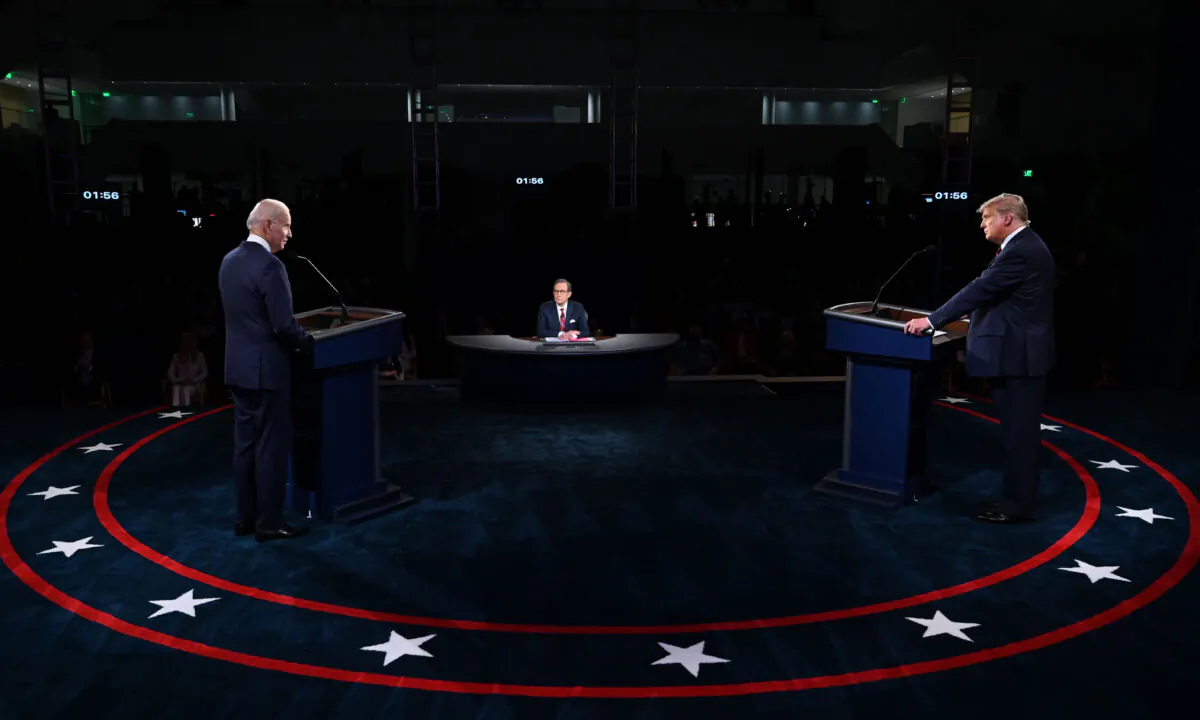 President Donald Trump, right, and Democratic presidential nominee Joe Biden take part in the first presidential debate at Case Western Reserve University and Cleveland Clinic in Cleveland, Ohio, on Sept. 29, 2020. (Olivier Douliery/Pool/AFP via Getty Images)