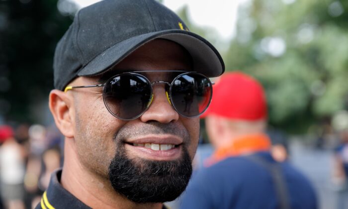 Proud Boys leader Enrique Tarrio smiles during a march in Portland, Ore., on Aug. 17, 2019. (John Rudoff/AFP via Getty Images)