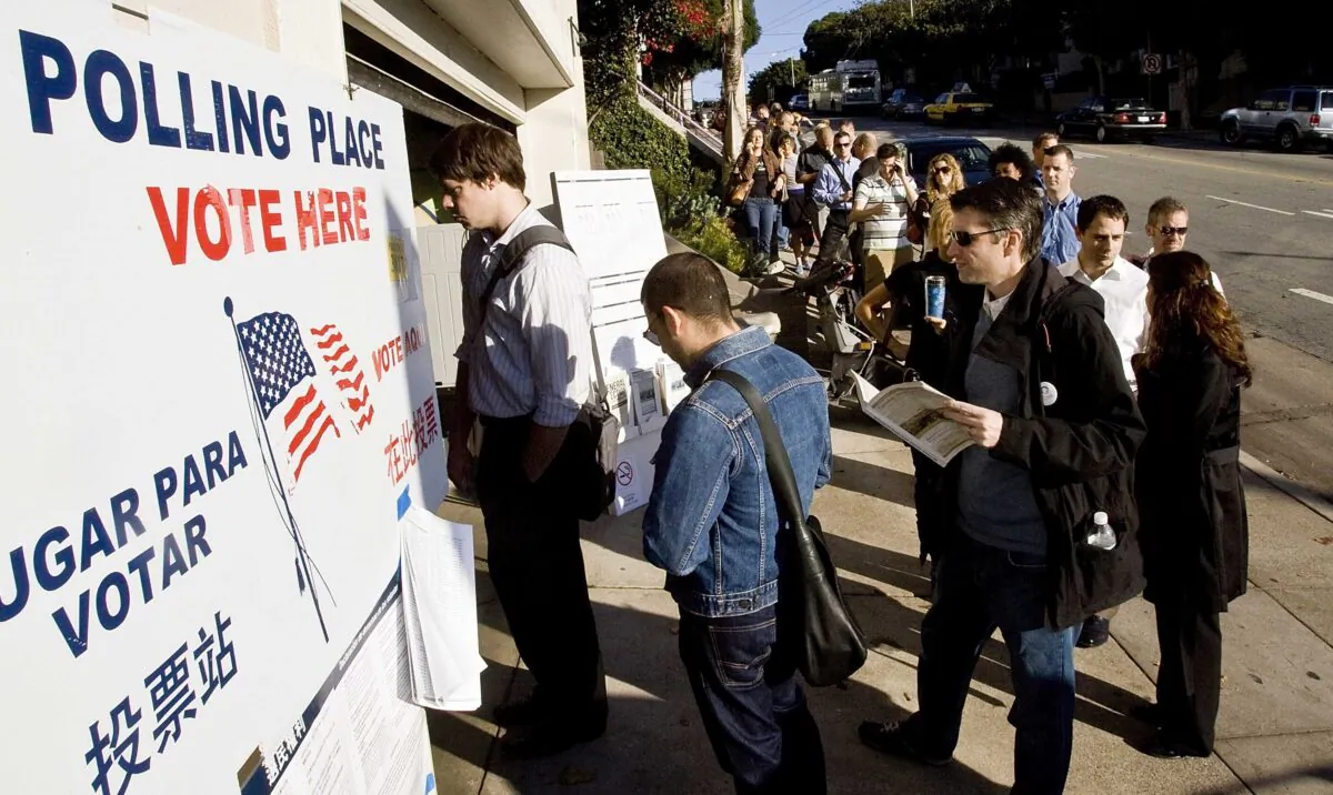 People wait in line to vote on Castro Street in San Francisco, Calif., on Nov. 4, 2008. (David Paul Morris/Getty Images)