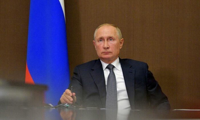 Russian President Vladimir Putin chairs a meeting of the Presidium of the State Council, via a video conference call in Sochi, Russia, on Sept. 28, 2020. (Sputnik/Alexei Druzhinin/Kremlin via Reuters)