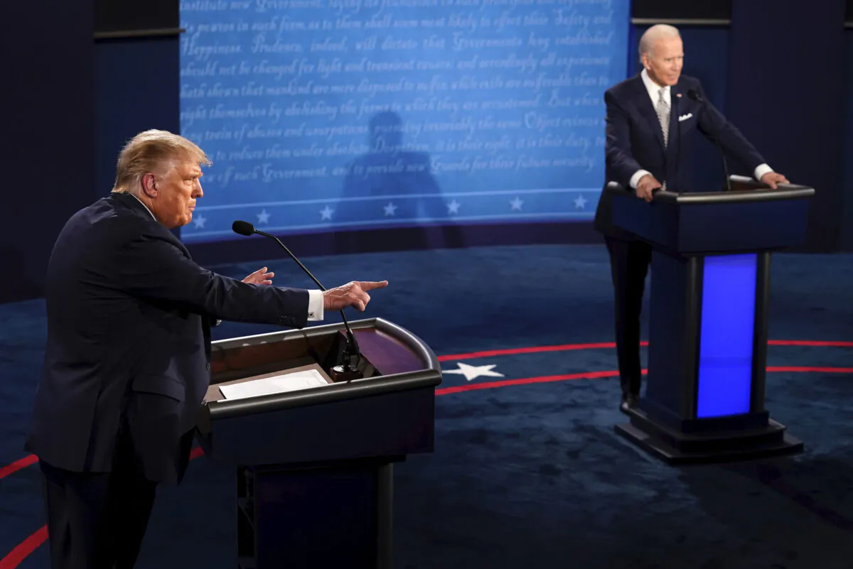 President Donald Trump makes a point as Democratic presidential candidate former Vice President Joe Biden listens during the first presidential debate at Case Western University and Cleveland Clinic, in Cleveland, Ohio, on Sept. 29, 2020. (Morry Gash/Pool/AP Photo)
