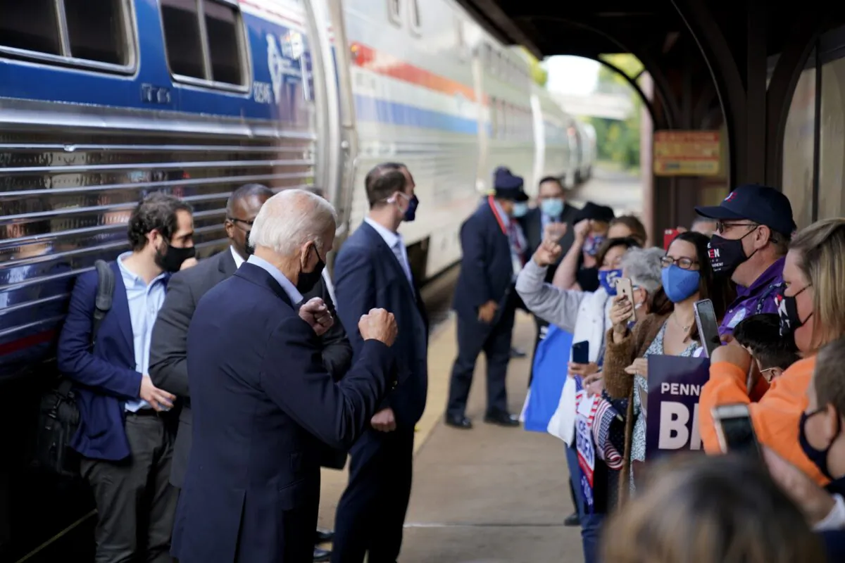 Democratic presidential nominee Joe Biden greets supporters on the platform outside the Amtrak's Greensburg Train Station in Greensburg, Penn., on Sept. 30, 2020. (Andrew Harnik/AP Photo)
