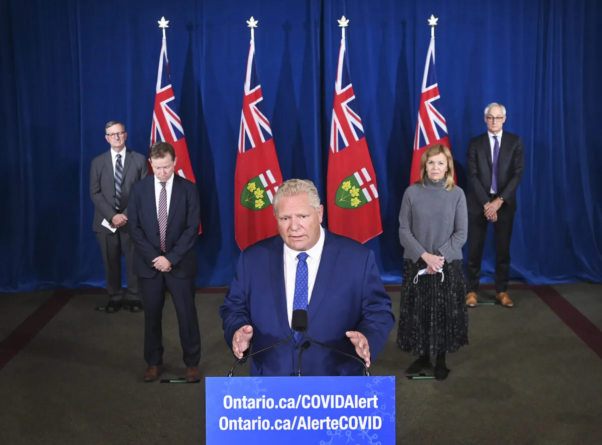 Ontario Premier Doug Ford holds a press conference with his medical team regarding new restrictions at Queen's Park during the COVID-19 pandemic in Toronto on Oct. 2, 2020. (The Canadian Press/Nathan Denette)
