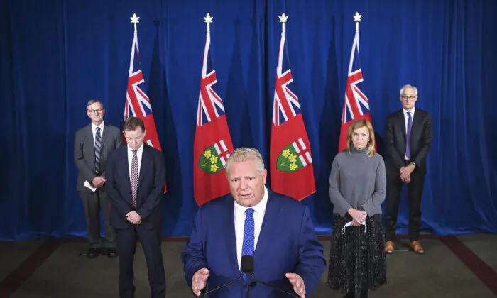 Ontario Premier Doug Ford holds a press conference with his medical team regarding new restrictions at Queen's Park during the COVID-19 pandemic in Toronto on  Oct. 2, 2020. (The Canadian Press/Nathan Denette)