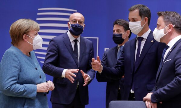German Chancellor Angela Merkel speaks with the others